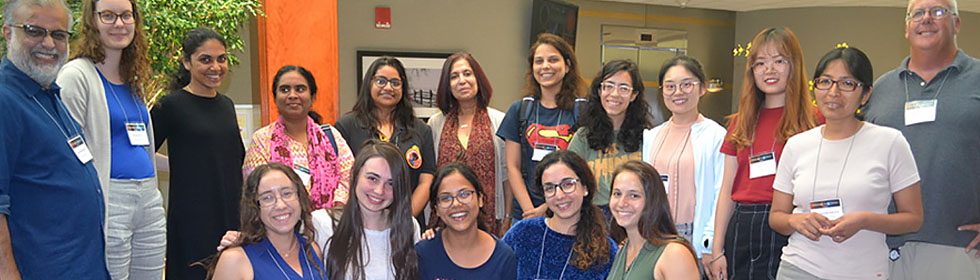 Women of the 2019 Heliophysics Summer School class, with Amitava Bhattacharjee (left), Lika Guhathakurta (center), and Dana Longcope (right). 