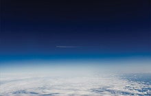 blue sky over white clouds