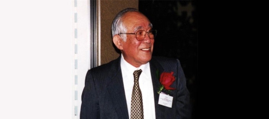 photo of Akio Arakawa in black suit