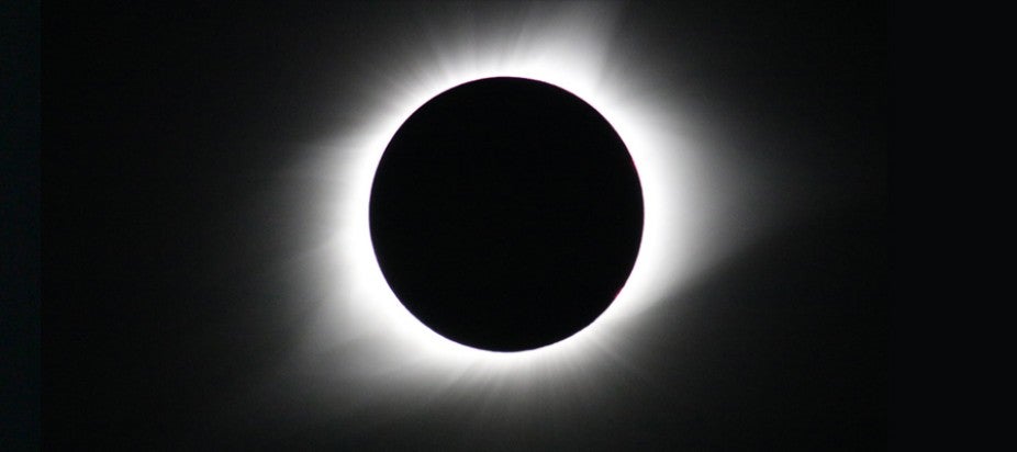 the moon passing in front of the Sun as seen from Earth