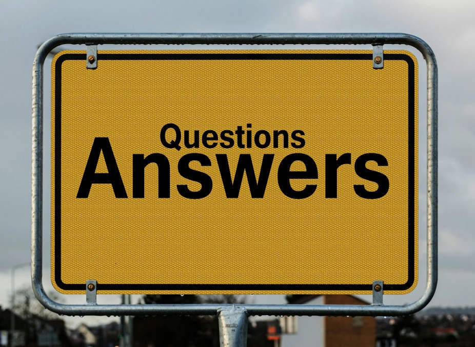 Picture of sign saying Questions Answers