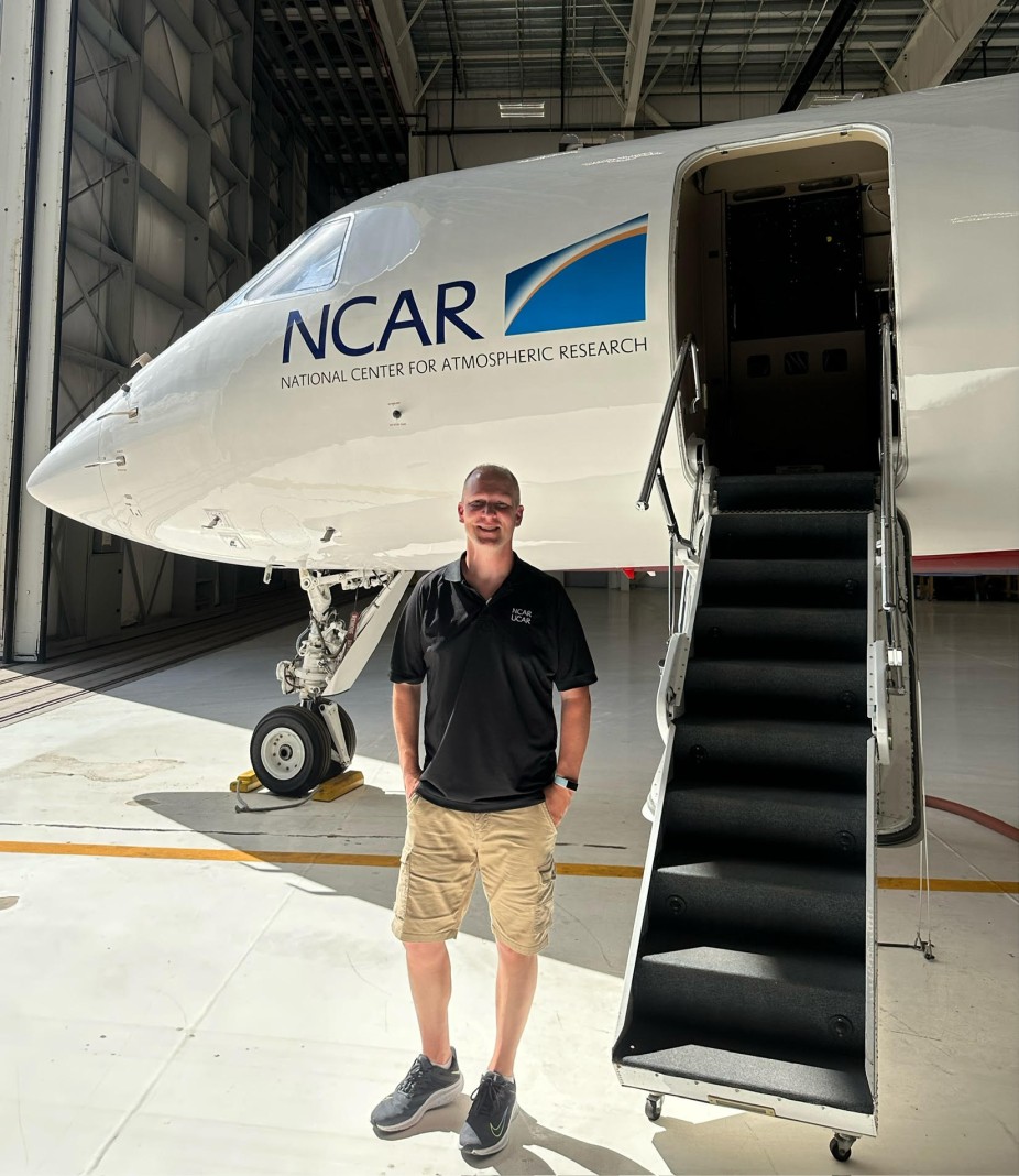 CPAESS' Joel Lampe in the Summer of 2023 at a Business Shared Services (BSS) Retreat during the tour at NCAR's Research Aviation Facility (RAF).