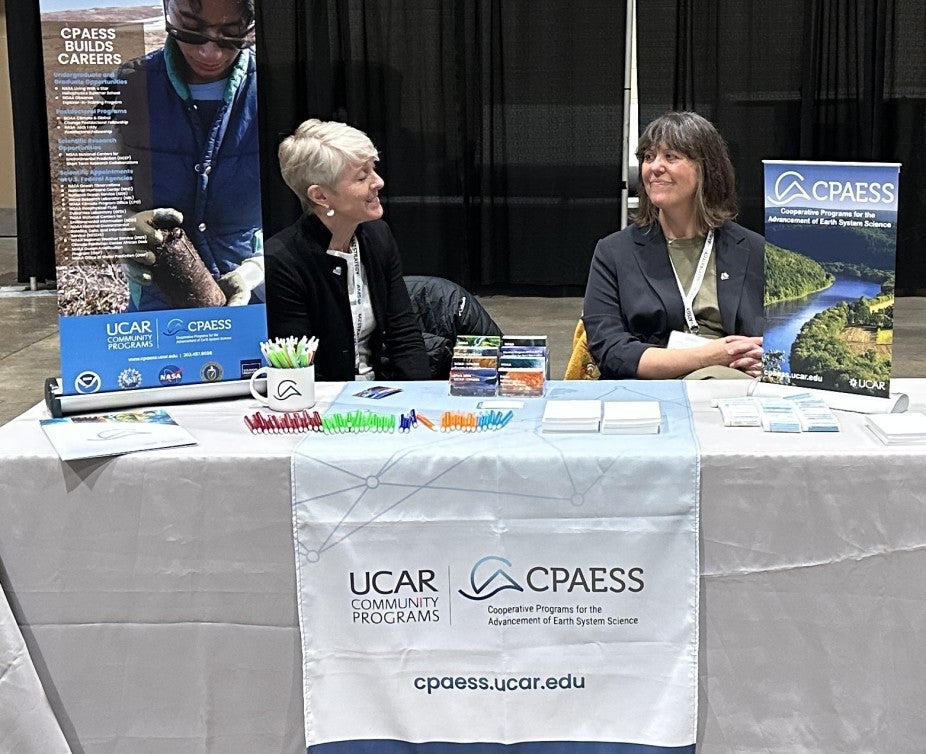 Program Specialist Kate Rodd & Assistant Director Tracey Baldwin prepping for the students to swarm the CPAESS table at the AMS Early Career Fair.