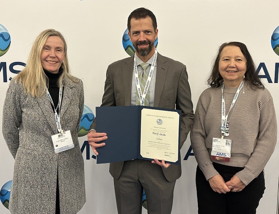 SPS | CPAESS Director Hanne Mauriello, New AMS Fellow and Chief Scientific Advisor Neil Jacobs; and SPS | CPAESS Deputy Director Cindy Bruyère at the Awards Ceremony at AMS 2025.