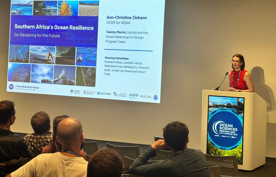 woman behind podium giving a talk