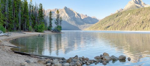 Lake in Idaho with pine trees