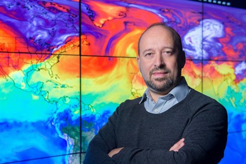 Gavin Schmidt in front of weather graphic