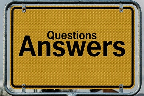 sign that says Questions Answers