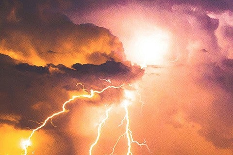 lightening with dark orange clouds