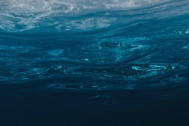 clear blue body of water