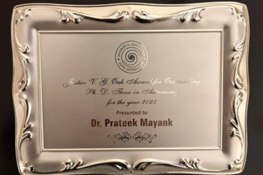 Silver tray with award text